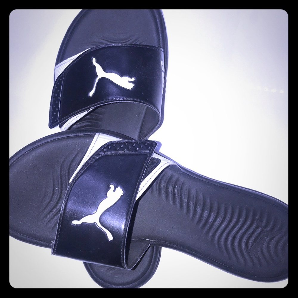 Puma slides.